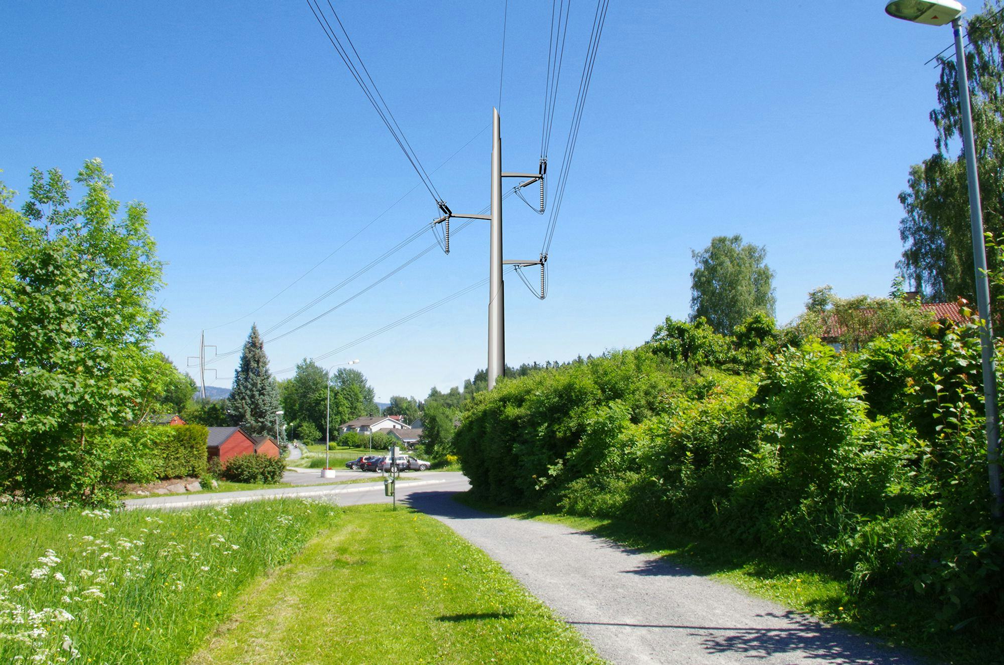 single transmission tower surrounded by green trees 